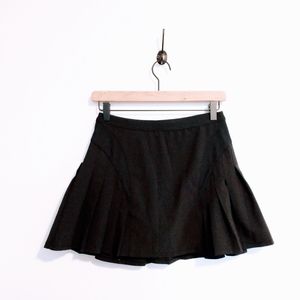 Black pleated tennis skirt with shorts.  Tail tech size xs